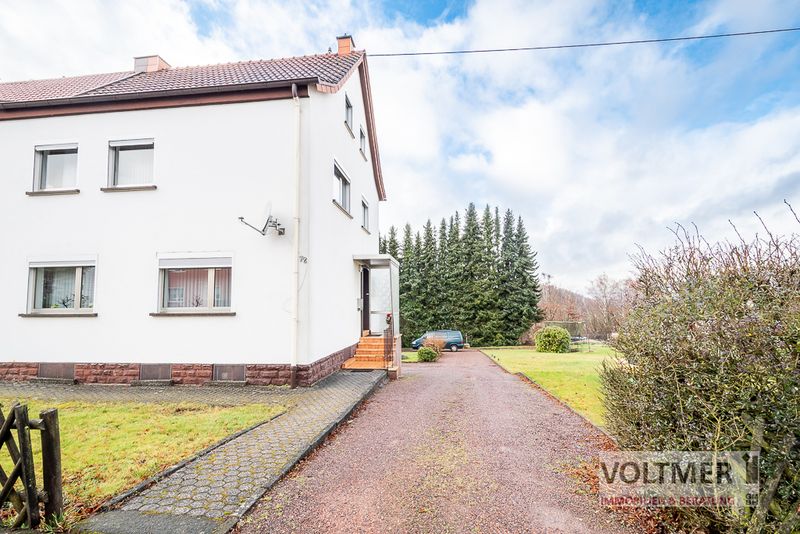 BEHAGLICH - Doppelhaushälfte mit gepflegtem Garten und Garage in Neunkirchen!